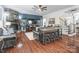 Cozy living room featuring hardwood floors, fireplace, and built-in shelving at 217 Ridge Reserve Dr, Lake Wylie, SC 29710