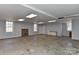 Unfinished basement with multiple windows for natural light at 2205 E Brief Rd, Monroe, NC 28110