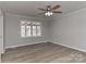 Bedroom featuring a ceiling fan, hardwood floors, and bright windows offering serene views at 2205 E Brief Rd, Monroe, NC 28110