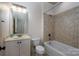 Bathroom features a bathtub, toilet and vanity with a large mirror at 2324 Ryan Conley Ct, Gastonia, NC 28056