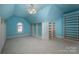 Large bedroom with abundant closet space and light blue walls at 2324 Ryan Conley Ct, Gastonia, NC 28056