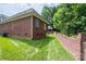 Brick house exterior with green lawn and brick wall at 2324 Ryan Conley Ct, Gastonia, NC 28056