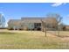 House exterior view with a large fenced backyard at 261 Nabors Rd, Statesville, NC 28677