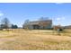 House exterior view with a large fenced backyard at 261 Nabors Rd, Statesville, NC 28677