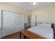 Bright bedroom with a double door closet and wood floors at 261 Nabors Rd, Statesville, NC 28677