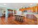 Spacious kitchen with wood cabinets, an island, and hardwood floors at 261 Nabors Rd, Statesville, NC 28677