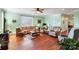 Living room with hardwood floors, neutral walls, and comfy seating at 261 Nabors Rd, Statesville, NC 28677