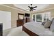 Spacious bedroom with large windows and wood furniture at 3024 Ambleside Dr, Fort Mill, SC 29707