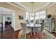 Bright breakfast nook features a round table and four chairs, with an abundance of natural light from bay windows at 3024 Ambleside Dr, Fort Mill, SC 29707