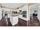 Island kitchen with granite countertops and stainless steel appliances at 3024 Ambleside Dr, Fort Mill, SC 29707