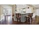 Kitchen features an island with seating and access to the dining area at 3024 Ambleside Dr, Fort Mill, SC 29707