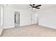 Bright bedroom with carpet, ceiling fan, and door to bathroom at 3040 Swallowtail Ln # 36, Kannapolis, NC 28083