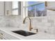 Kitchen sink with modern gold faucet and white quartz countertop at 3040 Swallowtail Ln # 36, Kannapolis, NC 28083