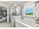 Spa-like bathroom with a large walk-in shower and soaking tub at 312 Coronado Ave # 41, Matthews, NC 28104