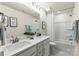 Double vanity bathroom with shower/tub combo at 312 Coronado Ave, Matthews, NC 28104