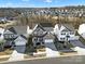 Aerial view of a residential neighborhood showcasing similar homes and well-maintained landscapes at 3155 Pinehills Way, Mount Holly, NC 28120