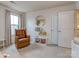 Bright Bedroom with recliner, storage, and natural light at 3203 Morgan Clark Rd, Charlotte, NC 28208