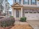 Townhouse exterior with a two-car garage and welcoming entrance at 3203 Morgan Clark Rd, Charlotte, NC 28208