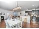 Modern kitchen with dark brown cabinets, stainless steel appliances, and granite countertops at 3322 Yarmouth Ln, Gastonia, NC 28056