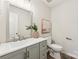 Updated bathroom with grey vanity, large mirror, and modern fixtures at 3366 Table Rock Dr, Gastonia, NC 28052