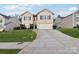 Two-story house with beige exterior, two-car garage, and a neat lawn at 3366 Table Rock Dr, Gastonia, NC 28052