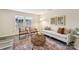 Living room with hardwood floors, neutral color palette, and a cozy seating area at 3366 Table Rock Dr, Gastonia, NC 28052