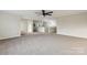 Spacious loft area with ceiling fan and neutral carpeting at 3366 Table Rock Dr, Gastonia, NC 28052