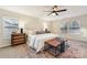 Main bedroom with stylish furniture and a ceiling fan at 3366 Table Rock Dr, Gastonia, NC 28052