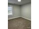 Spacious bedroom featuring neutral wall and carpet at 407 E Talleyrand Ave, Monroe, NC 28112