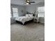 Spacious bedroom with carpeted floors and large windows at 407 E Talleyrand Ave, Monroe, NC 28112