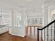 Bright living room with hardwood floors, bay window, and open floor plan at 4407 Esherwood Ln, Charlotte, NC 28270