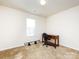 Bedroom with a desk and chair, carpeted floor, and window at 4529 Esmeralda Dr, Charlotte, NC 28269