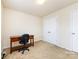 Bright bedroom with built-in closet and desk at 4529 Esmeralda Dr, Charlotte, NC 28269