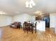 Kitchen with dark wood cabinets and black appliances at 4529 Esmeralda Dr, Charlotte, NC 28269