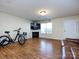 Spacious living room with hardwood floors and a fireplace at 4529 Esmeralda Dr, Charlotte, NC 28269