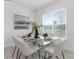 Elegant dining room with glass table and modern chairs at 478 Berryman Rd, Rock Hill, SC 29732