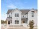 White farmhouse-style townhome with a white picket fence at 478 Berryman Rd, Rock Hill, SC 29732