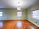 Dining room featuring hardwood floors and large windows at 48374 Pfeiffer Pl, Misenheimer, NC 28109