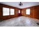 Dining room with wood paneling, tile floor, and built-in shelving at 48374 Pfeiffer Pl, Misenheimer, NC 28109