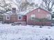 Brick ranch home with snow-covered yard at 48374 Pfeiffer Pl, Misenheimer, NC 28109