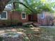 Brick house with a large tree in the front yard at 48374 Pfeiffer Pl, Misenheimer, NC 28109