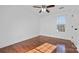 Bedroom with wood floors, ceiling fan and window at 507 Bearbrook Ln, Gastonia, NC 28052