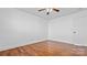 Spacious bedroom with wood floors and ceiling fan at 507 Bearbrook Ln, Gastonia, NC 28052