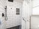 Modern bathroom with black matte fixtures, white subway tile, and marble shower curtain at 509 Baucom Deese Rd, Monroe, NC 28110