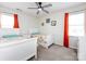 Bright bedroom with two twin beds, colorful bedding, and natural light at 509 Baucom Deese Rd, Monroe, NC 28110