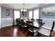 Spacious dining room featuring a large table with seating for eight, perfect for Gathering gatherings and dinner parties at 509 Baucom Deese Rd, Monroe, NC 28110