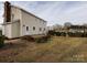 Beige house with a wooden deck and above-ground pool in the backyard at 509 Baucom Deese Rd, Monroe, NC 28110