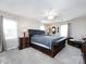 Main bedroom with plush carpet, large bed, and ensuite bathroom at 509 Baucom Deese Rd, Monroe, NC 28110