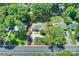 This overhead angle reveals a lovely home and a well kept yard, surrounded by mature trees at 532 Scaleybark Rd, Charlotte, NC 28209