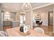 Open concept dining area with kitchen and living room views at 532 Scaleybark Rd, Charlotte, NC 28209